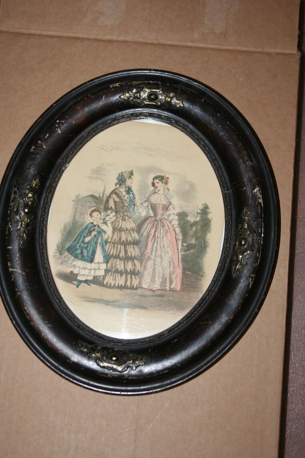 Antique embellished  wooden(walnut?) Oval frame with French Fashion Print