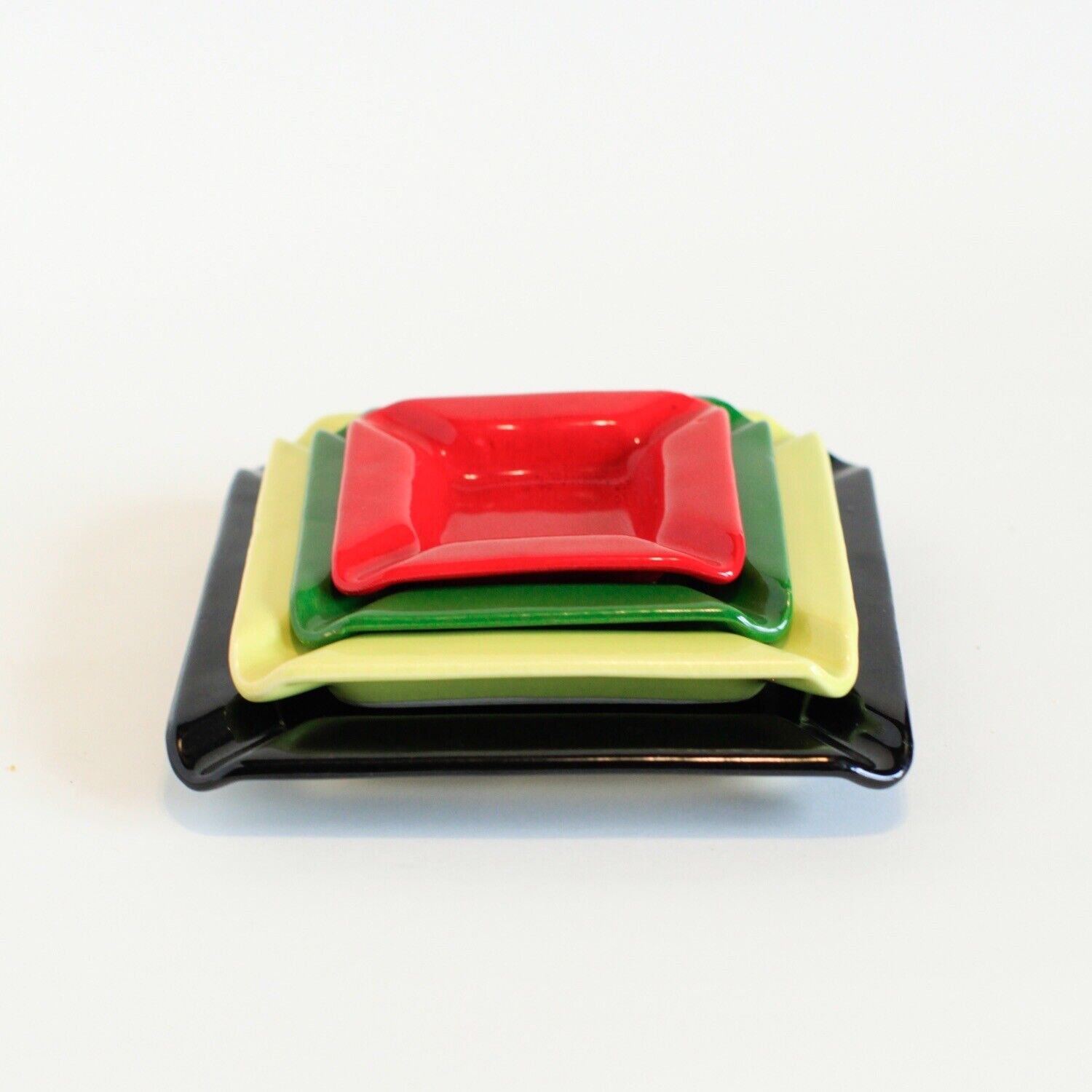 Set Of 4 Mid Century Modern Ashtrays Stackable Black Yellow Green Red Ceramic