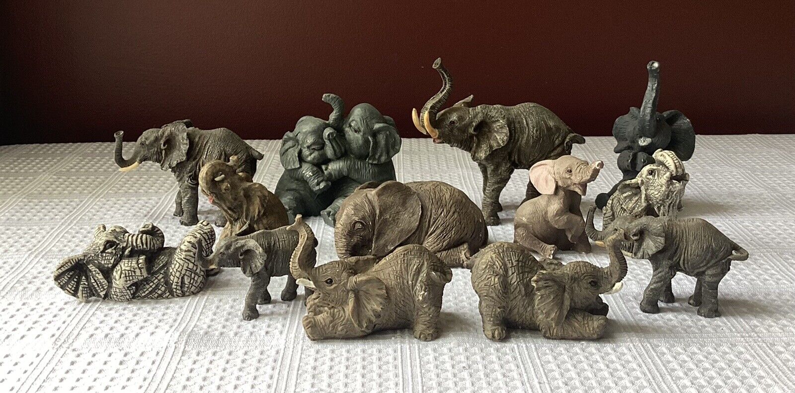 Lot of 13 Vintage Miniature Elephant Figurines, Largest 3 1/4” T x 4” L