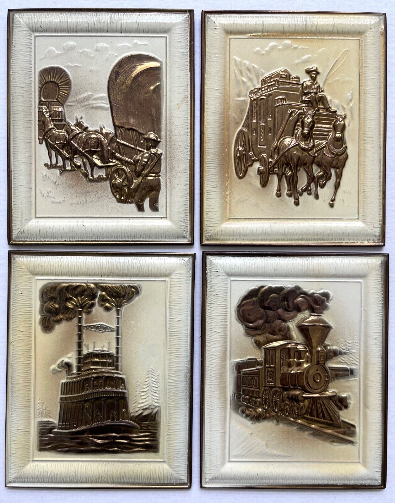 set of 4 vintage brass wall plaque set, wagon train, steamboat and stagecoach