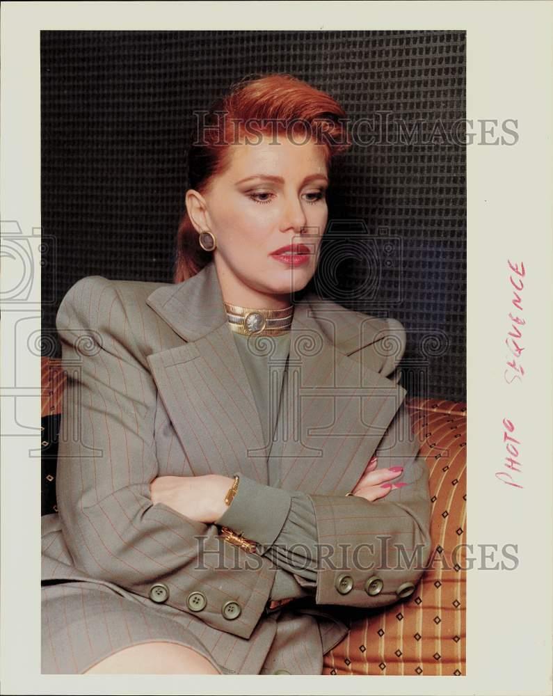 1989 Press Photo Georgette Mosbacher sits with arms folded at Ritz Carlton.