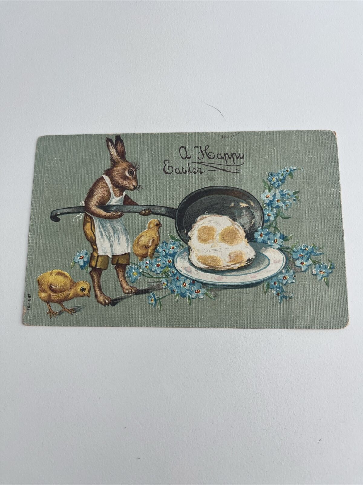 HOLIDAY  Postcard--A Happy Easter-Bunny with Large Frying Pan Frying Eggs-Chicks