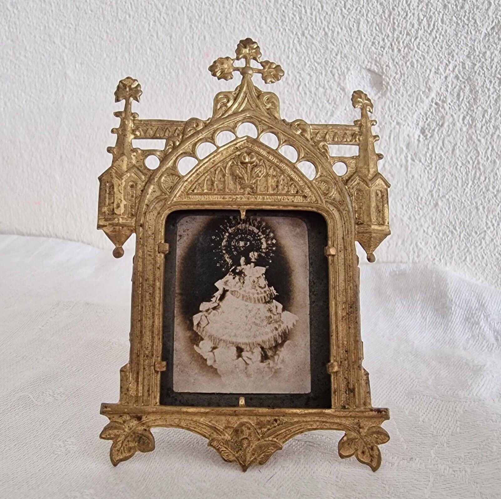 Antique traveling chapel of Virgin and Child. Gilded brass and albumen