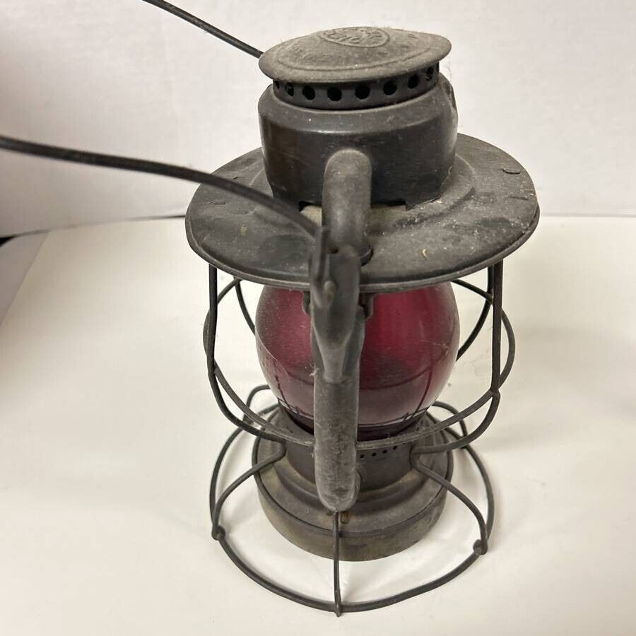 Vintage Dietz railroad lantern with red glass globe