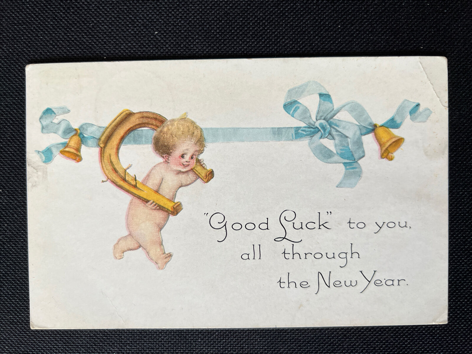 Baby with Horseshoe New Year Card 