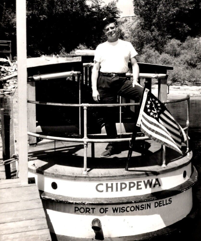 RPPC Man Stands On Boat \'Chippewa\' w/ Flag PORT OF WISCONSIN DELLS VTG Postcard