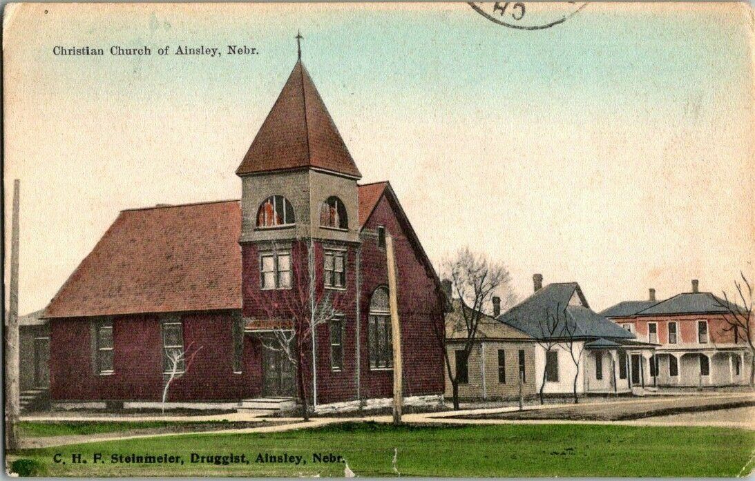 1909. CHRISTIAN CHURCH. AINSLEY, NEBRASKA. POSTCARD t11