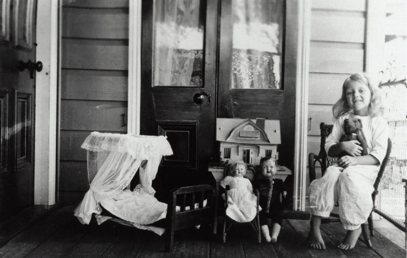 Black and White Photo Girl Child Playing with Dolls on Porch  8x10 Reprint  A-6