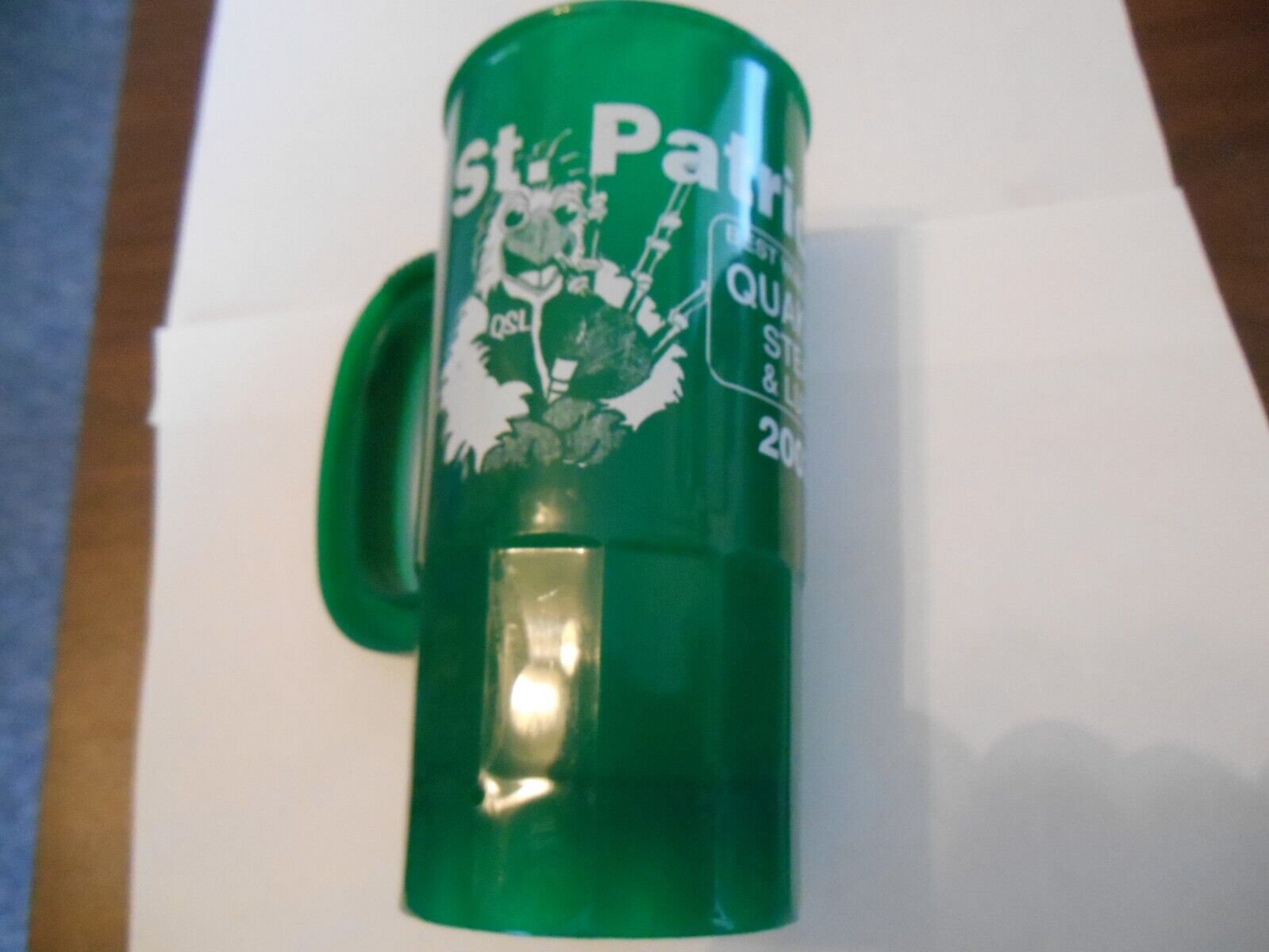 St.Patty's Day plastic cup Green w/ white Lettering 2003 Quaker Steak & Lube
