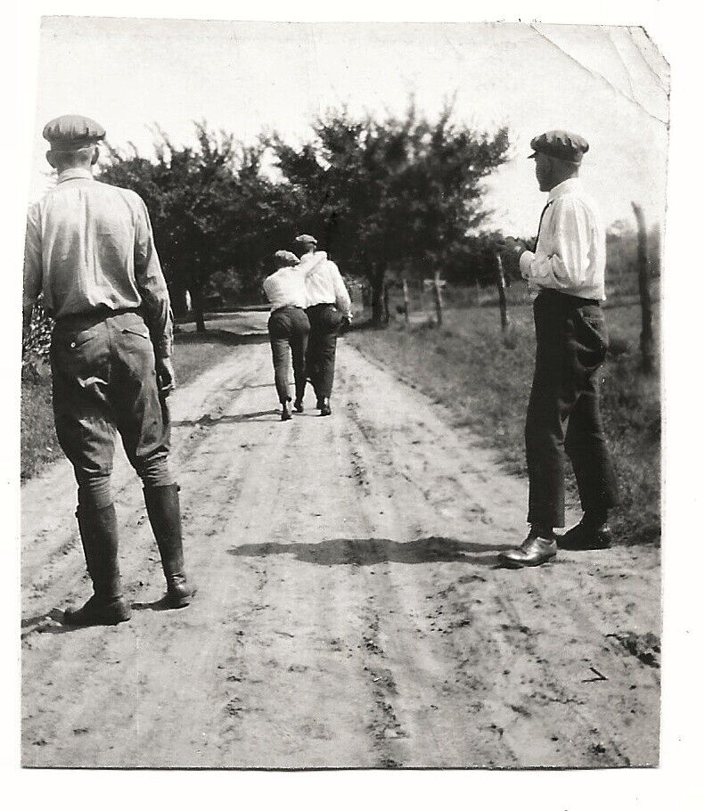 Vintage Old 1920 Funny Photo of Men Walking Away In between 2 other Men Offended