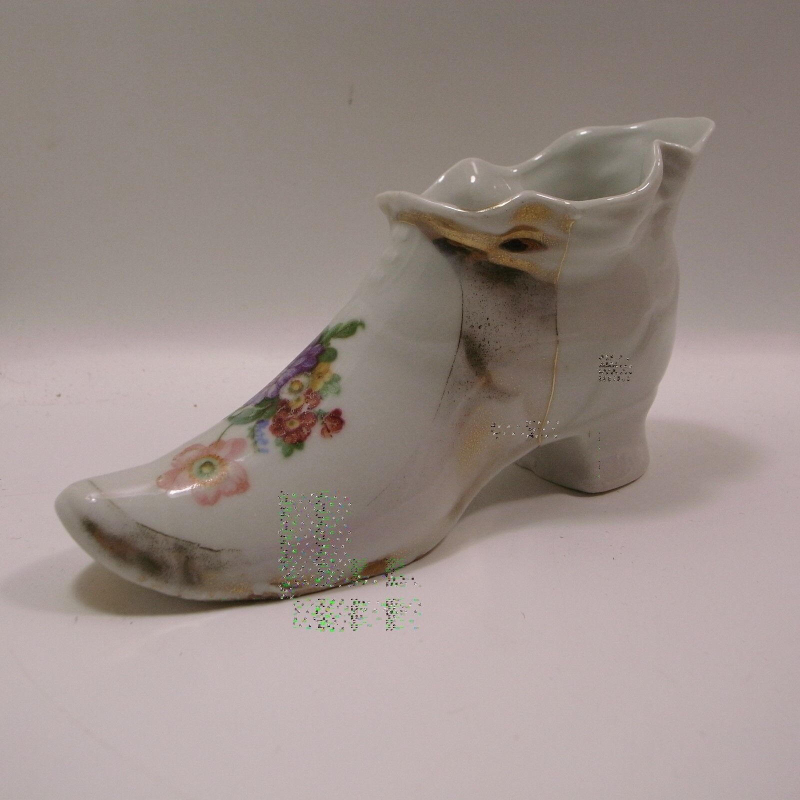 Porcelain shoe souvenier with colorful flowers, 20th Century