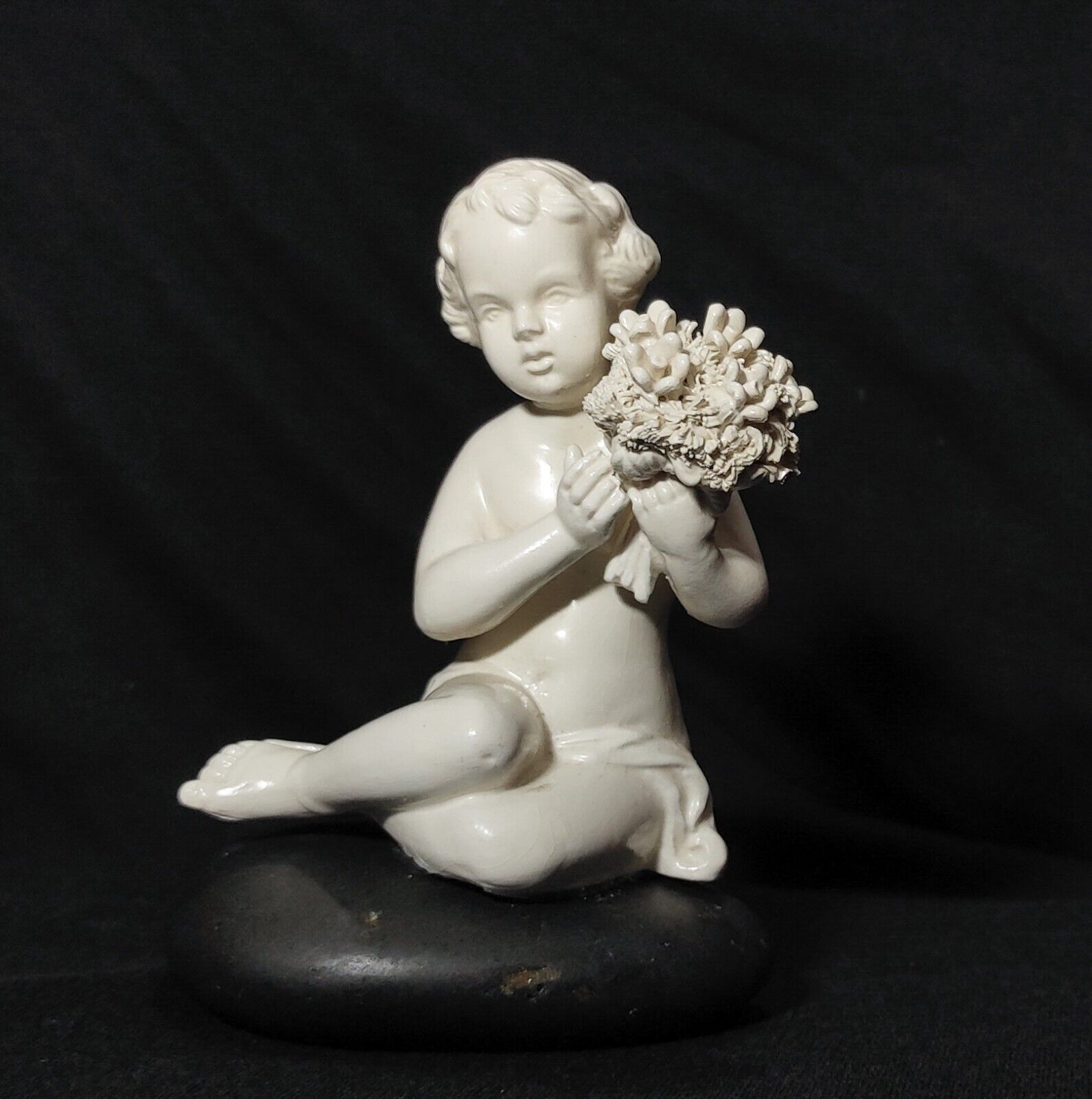 Girl W/ Flowers Sits on a Black Rock, Vintage White Matte Porcelain Figurine