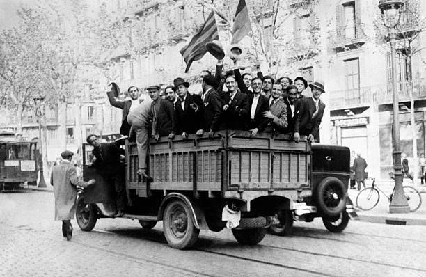 Truck driving through streets waving Catalan and Republican fl- 1931 Old Photo
