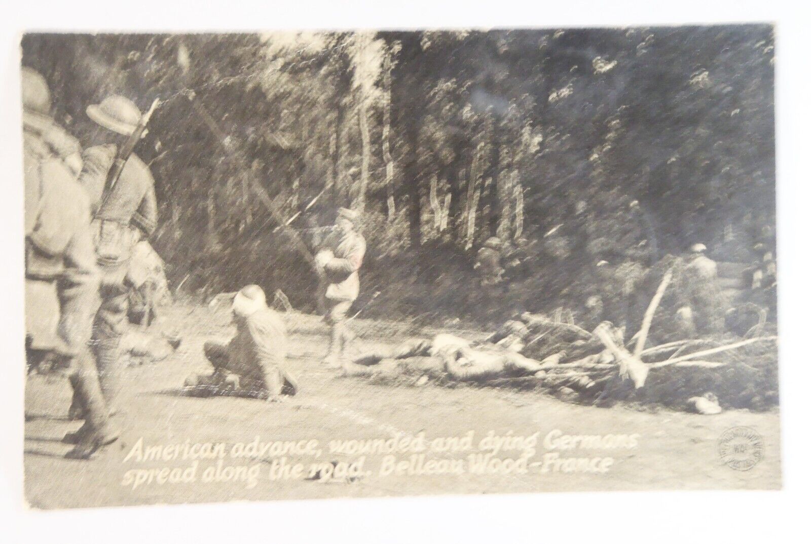 WWI Postcard of American Soldiers Advancing by Wounded German Soldiers in France