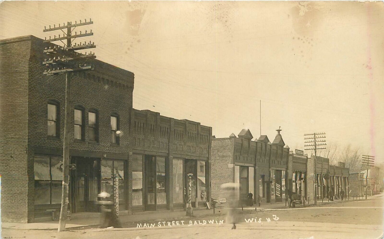 Postcard RPPC Photo C-1910 Wisconsin Baldwin Main Street 22-13535