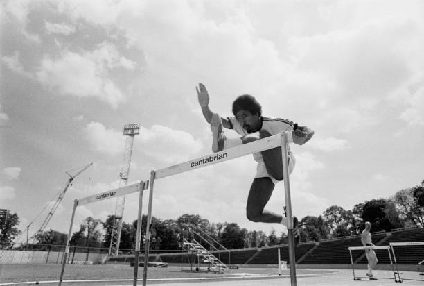 Daley Thompson jumping over obstacles during trainig UK 1976 OLD PHOTO