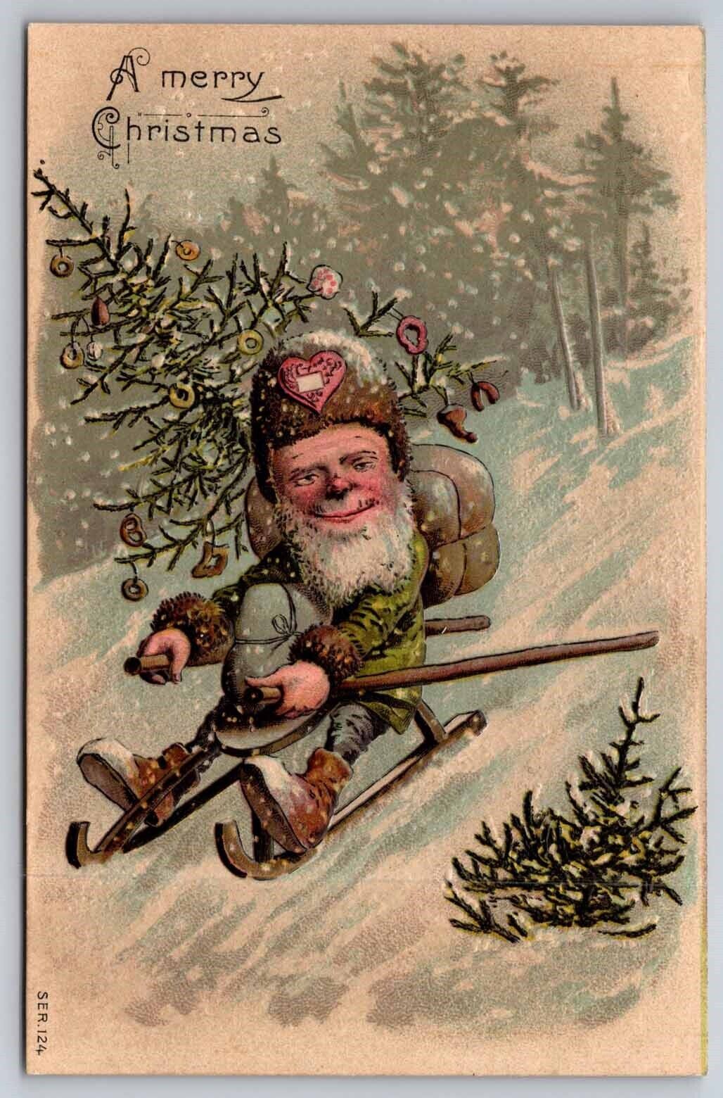 Brown Robed Santa on Sled w/ Christmas Tree c1908 Embossed Postcard