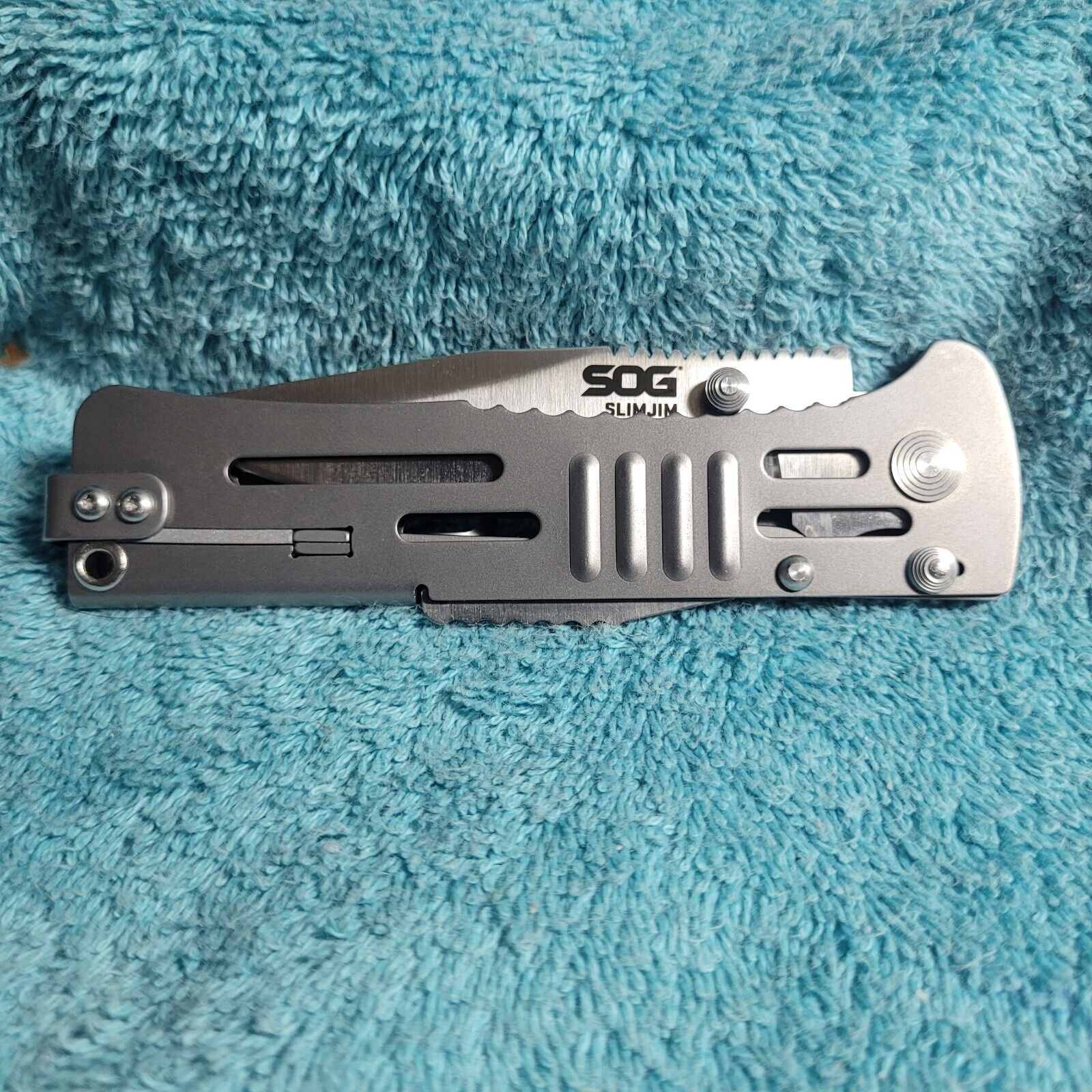 SOG Slimjim Lockback A/O Assisted AUS-8 Satin, Great Condition And Very Sharp.
