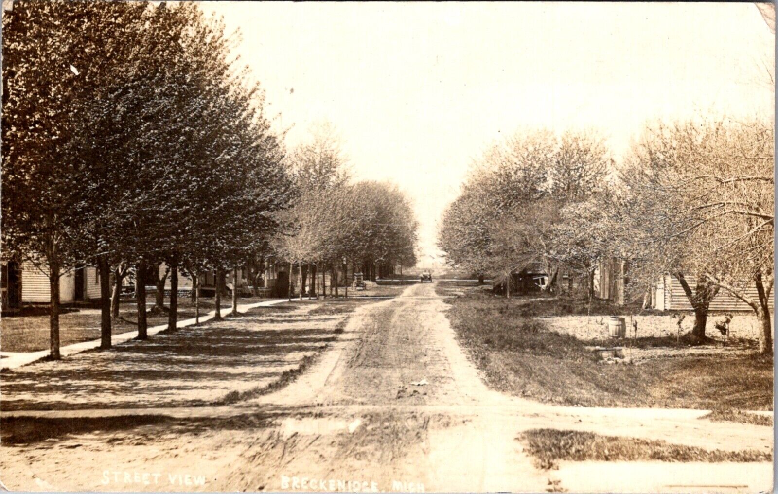 Real Photo Postcard Street View of Breckenridge, Michigan