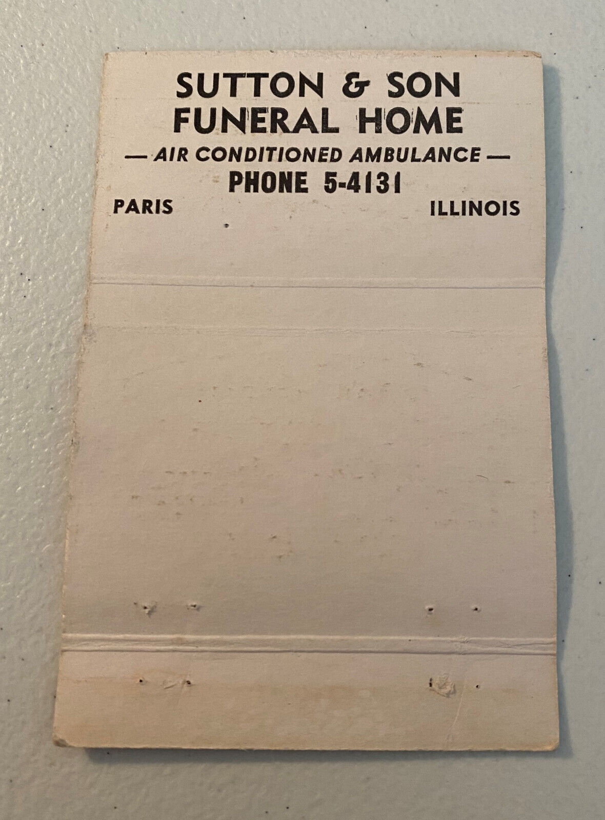 Vintage Sutton & Son Funeral Home, Paris Illinois, front strike matchbook cover