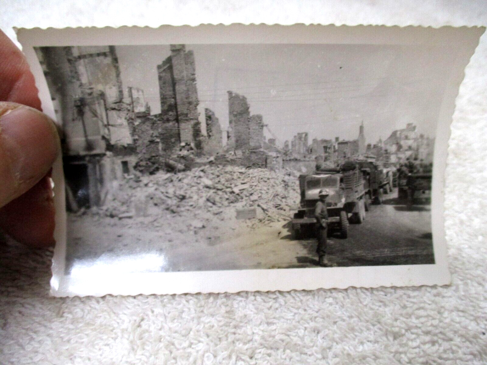 Original vintage photo WWII U.S. G.I.\'S CONVOY IN BOMBED OUT TOWN