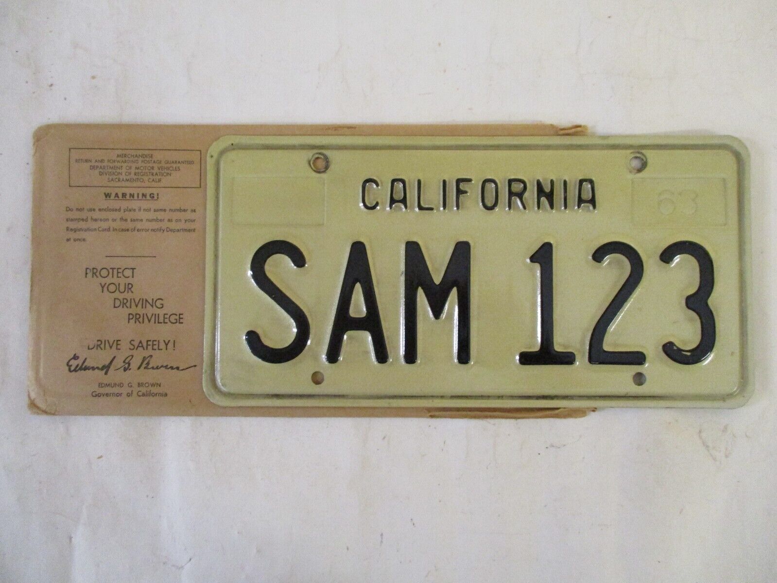 1963 California TEST SAMPLE PROTOTYPE  License Plate Tag with wrapper
