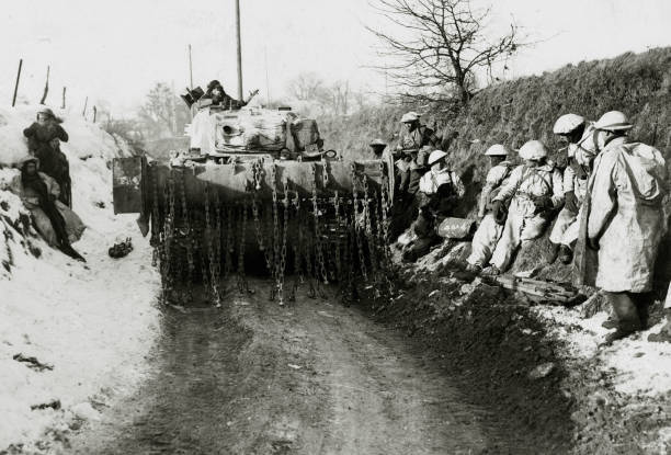 A British flail tank passing along a narrow lane near Heinsber - 1945 Old Photo