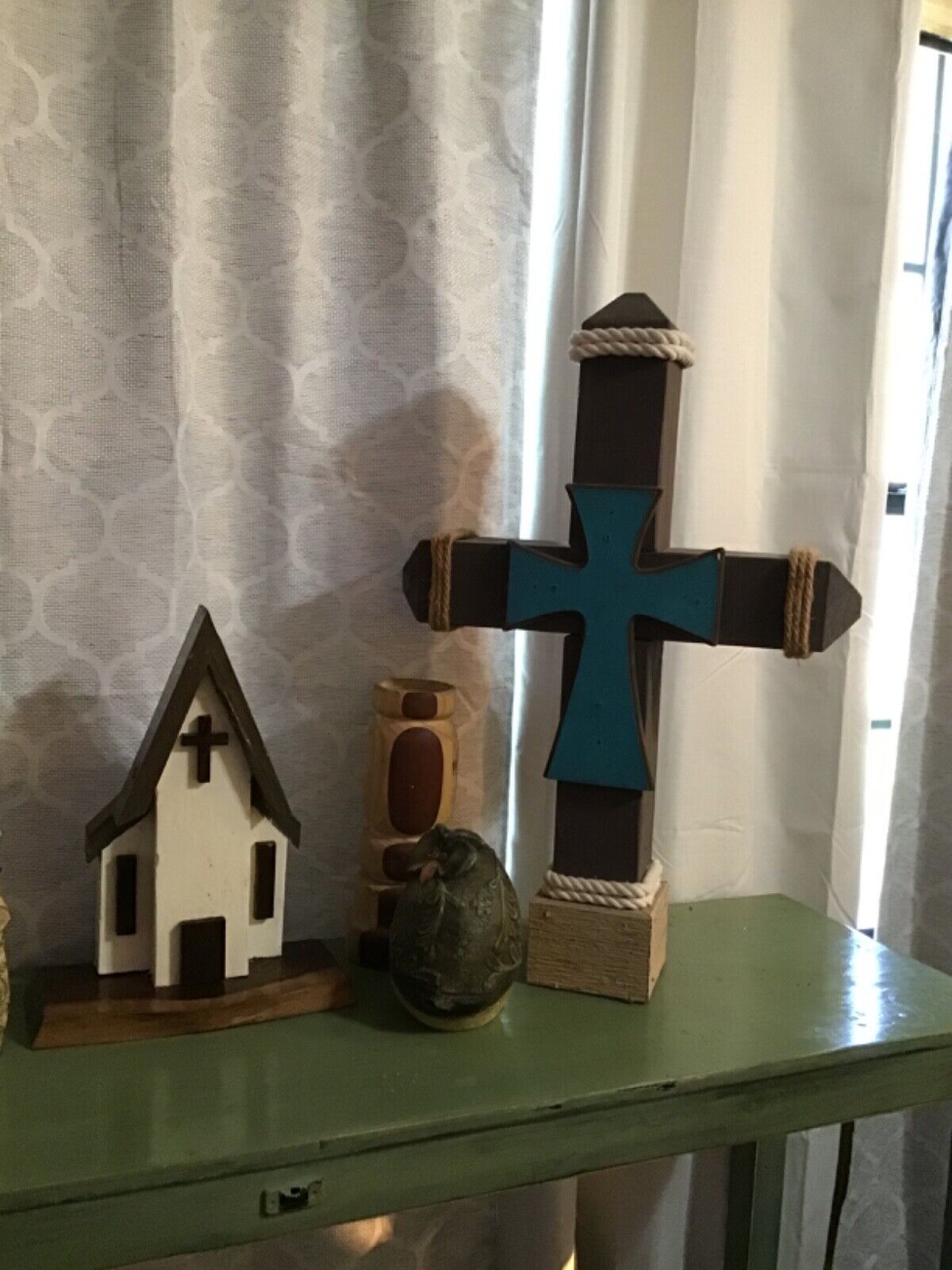 wooden cross with colored cross in center