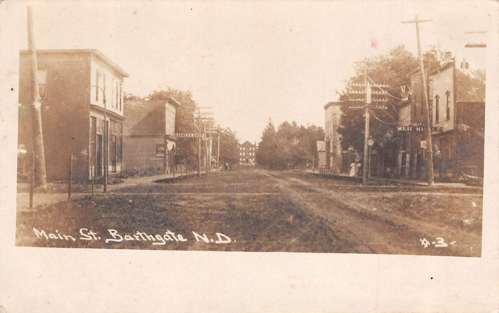 RPPC Main St Barthgate (Bathgate) North Dakota Dirt Street Kruxo 1909 Postcard