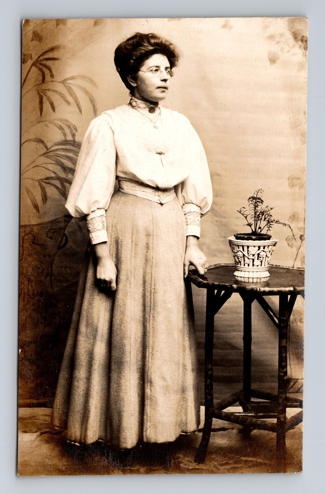 RPPC Postcard Taunton Distinguished English Woman with Sad Plant