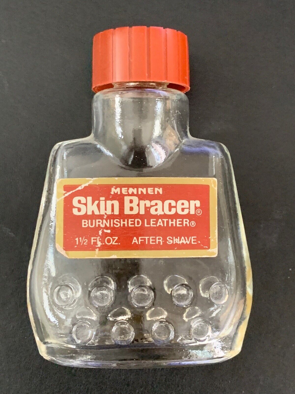 Vintage BURNISHED LEATHER SKIN BRACER by Mennen 1.5 fl oz Empty Bottle - USA