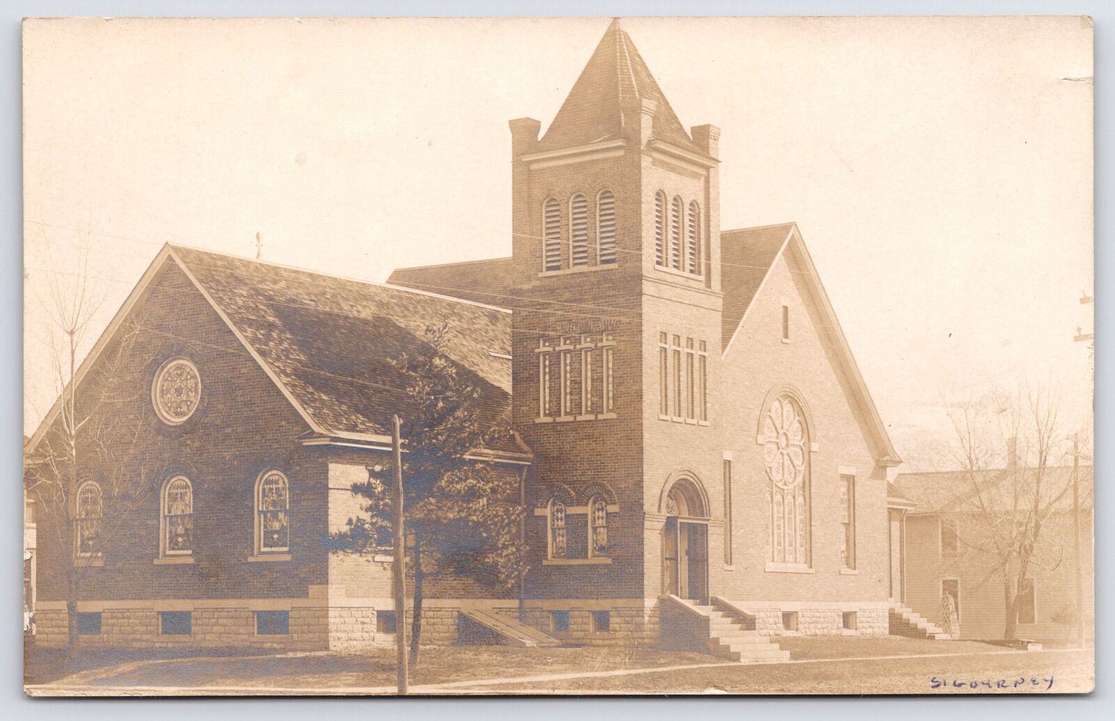 Sigourney Iowa~Round Windows~Petals~United Methodist Episcopal Church~c1910 RPPC