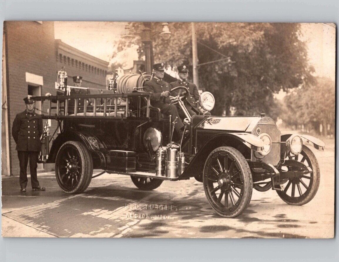 c1910 Firemen On Old Fire Truck Fire Department Albion Michigan MI RPPC Postcard