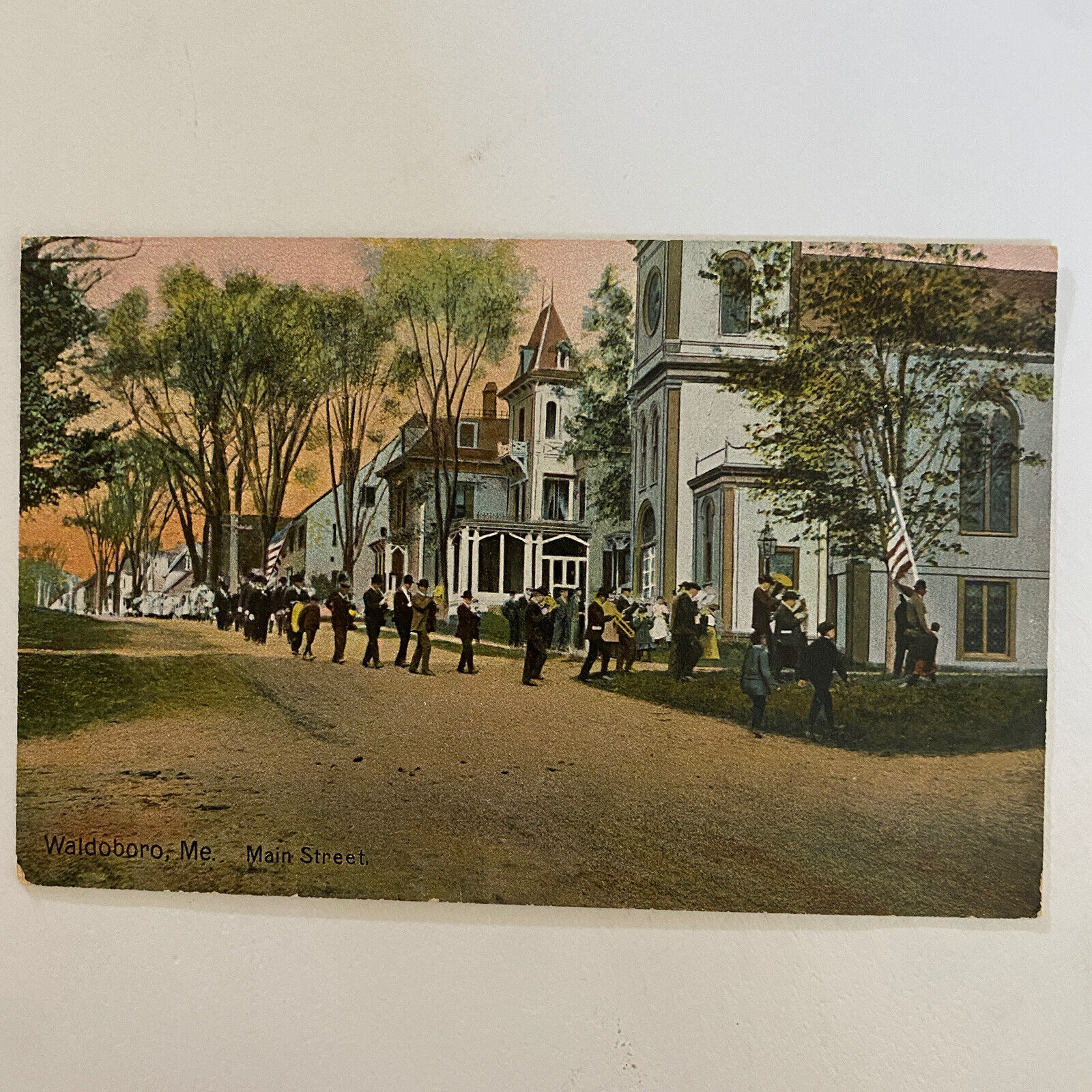 Waldoboro ME 1909 postcard Main Street view, band marching, following flag