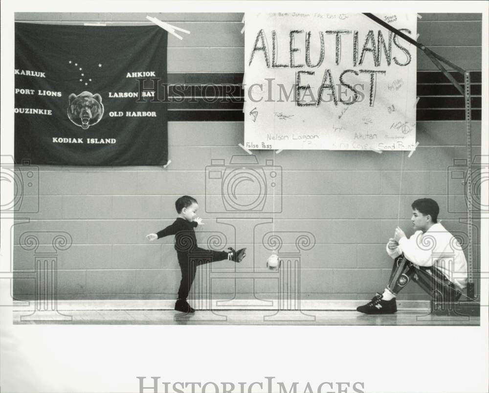 1991 Press Photo Toddler High Kicks at Native Youth Olympics, UAA - lrb06535