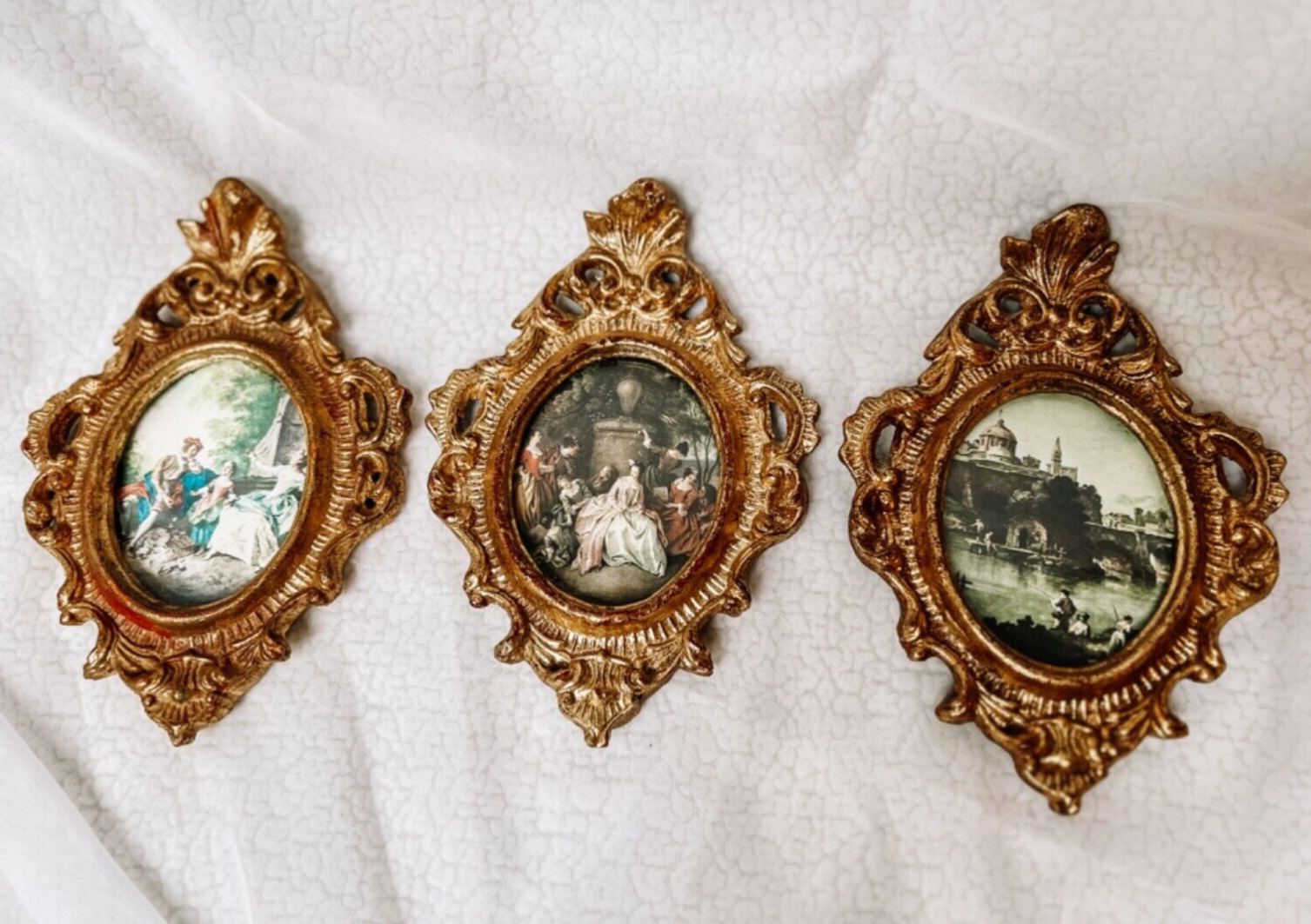 Three vintage Italian Florentine gilt wood framed prints