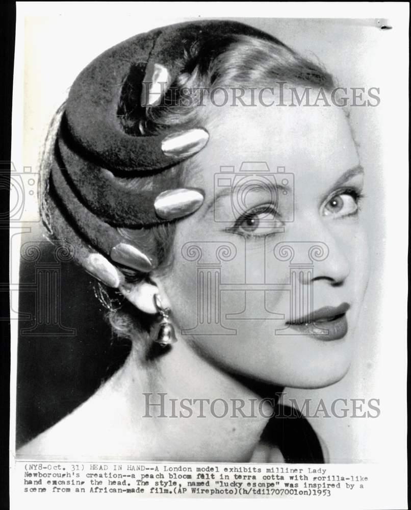 1953 Press Photo Model wears hat designed by milliner Lady Newborough in London