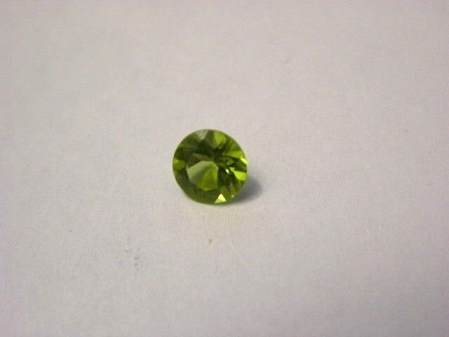 Peridot gemstone all natural India faceted 6mm round brilliant