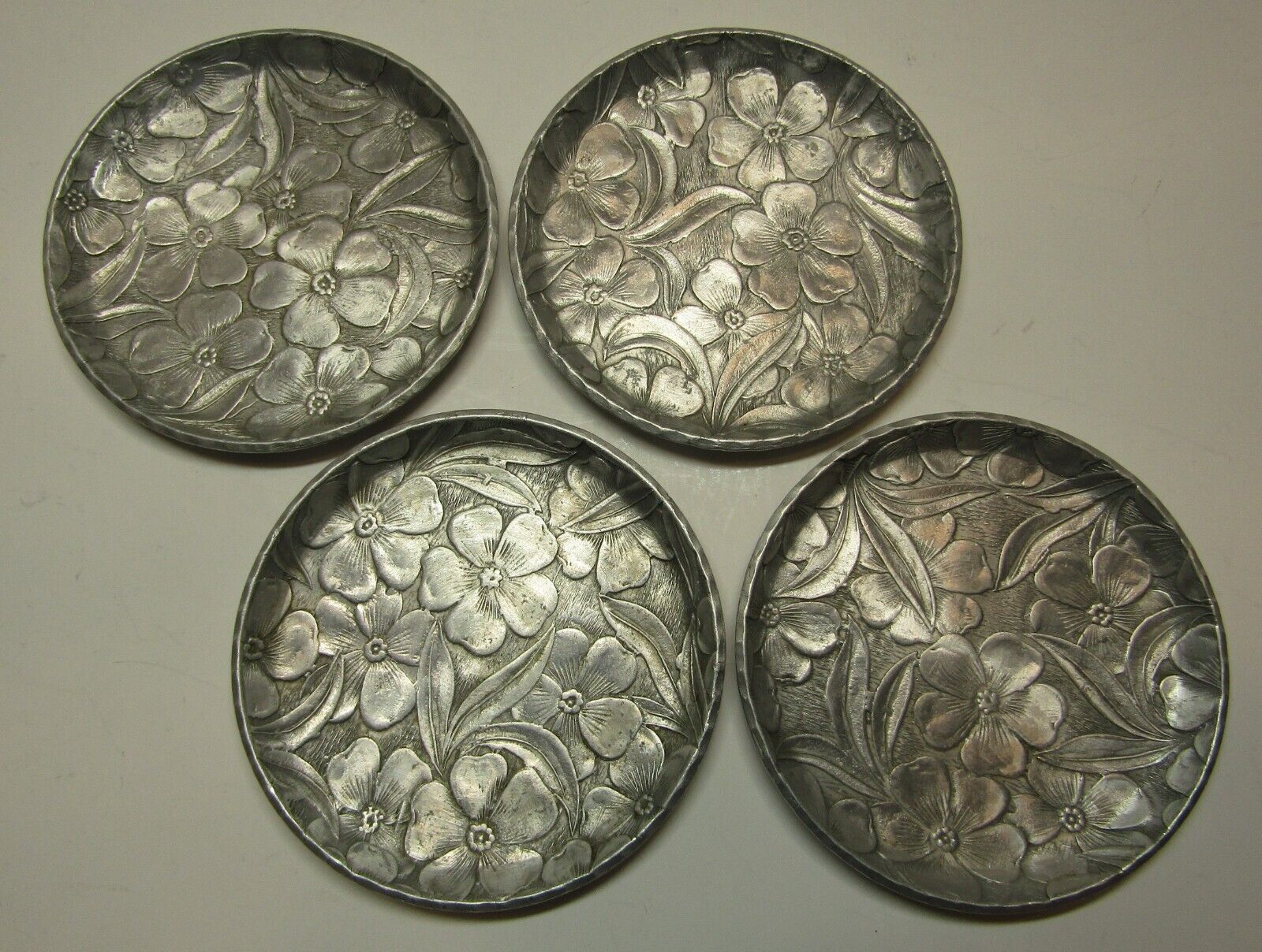 Vintage Set of 4 *Everlast* Forged Aluminum Coasters w/ Floral Pattern - 3 1/2\
