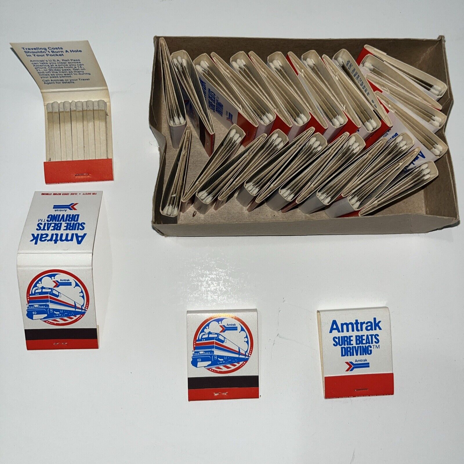 31 AMTRAK Rail New Books Of Matches - All  Unused.  “Sure Beats Driving” Advert