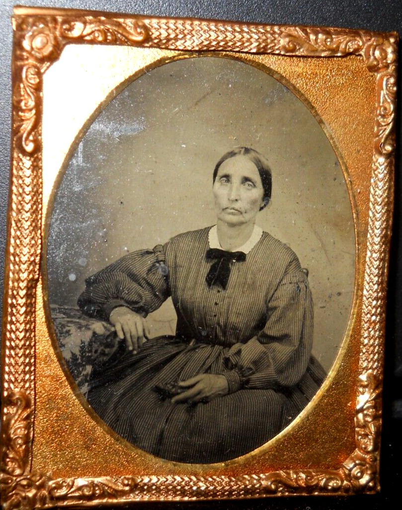 1/9th Size Tintype of older lady in brass mat/frame