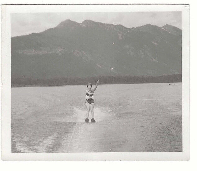 Woman Waving Water Skiing On Lake 1960s Snapshot Vintage Vernacular Photo