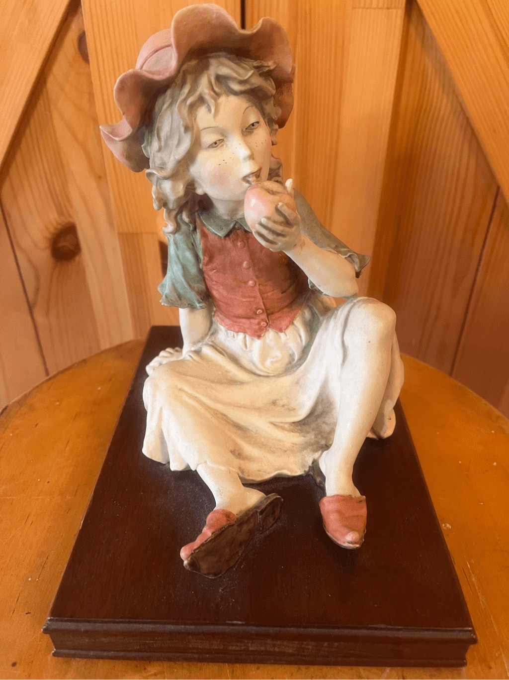 Signed A.G. Armani/Capodimonte Green Eyed Girl Eating Apple Porcelain Sculpture