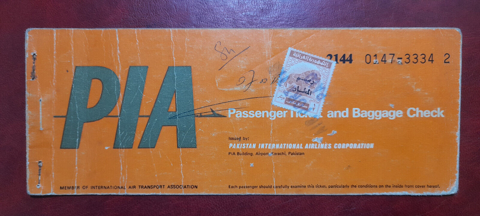 PIA AIRLINES PASSENGER TICKET WITH IRAQ HALF DINAR REVENUE TAX STAMP