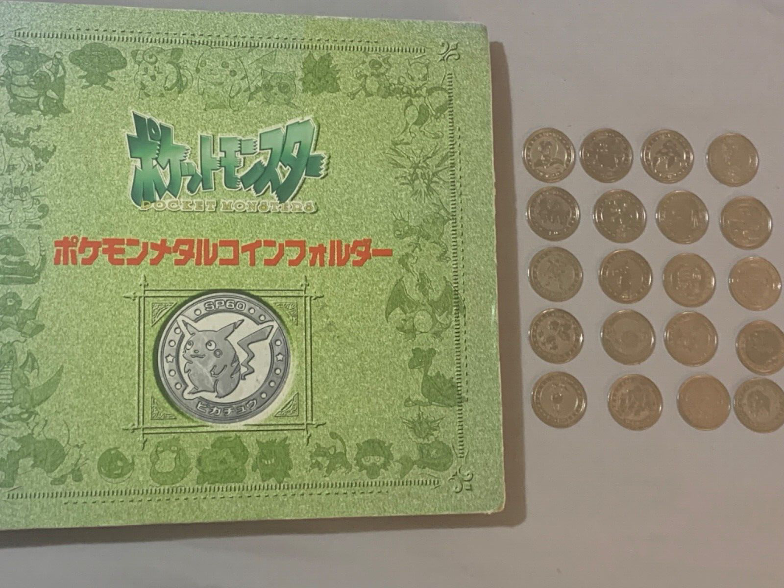 Pokemon Meiji Coins Lot of 20 with book Japanese Rare 