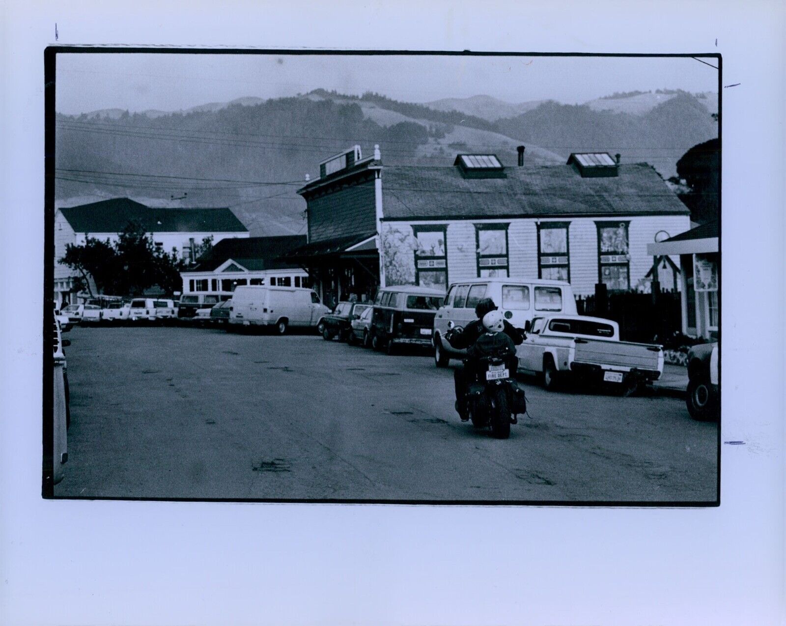 1983 Bolinas CA Motorcyclist Riding Down Wharf Road Press Photo