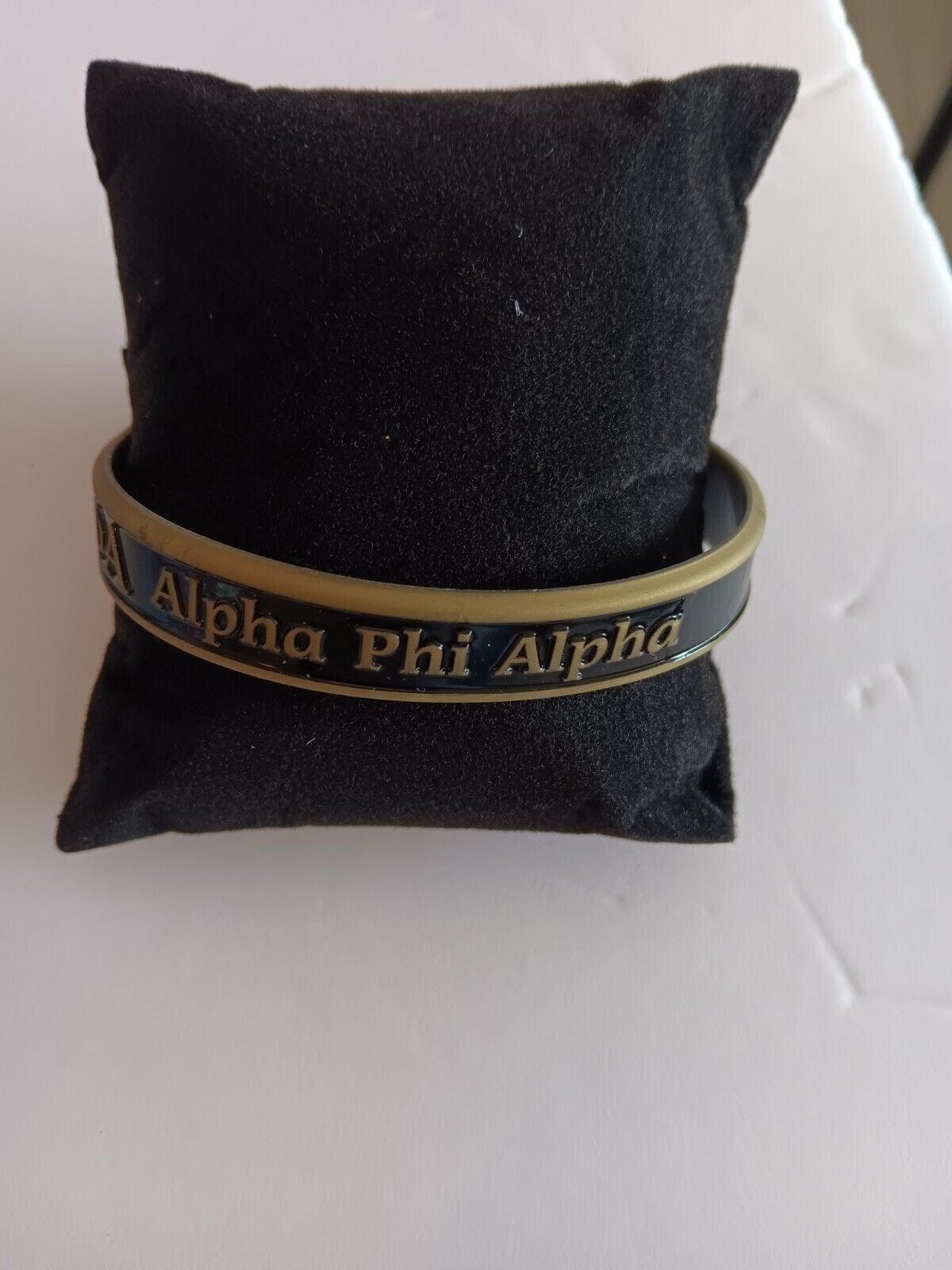 Alpha Phi Alpha Black And Gold Wrist Band
