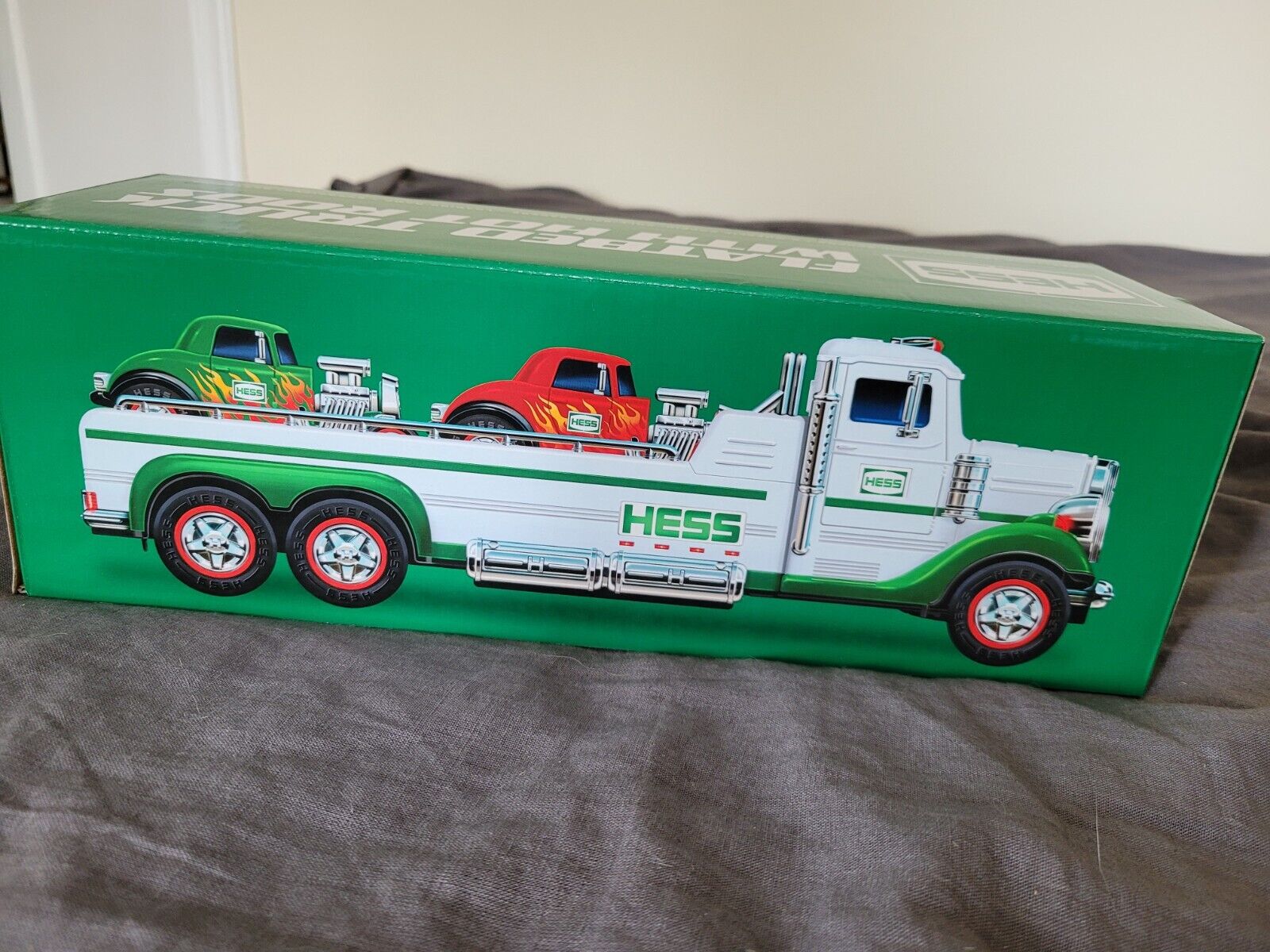 Hess 2022 Flatbed Truck with 2 PULL-BACK Hot Rods Cars LED Lights and Sound New