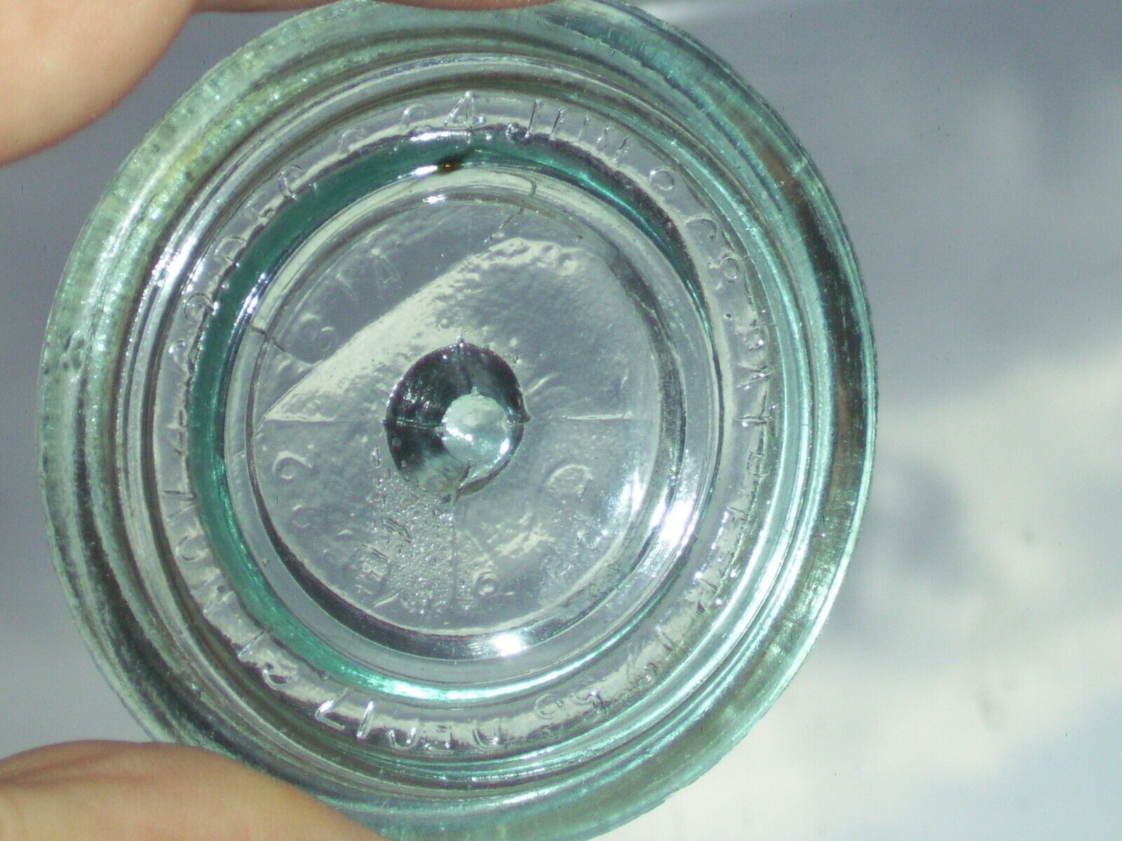 Weak embossed dates, The Gem midget glass canning jar insert & no zinc band