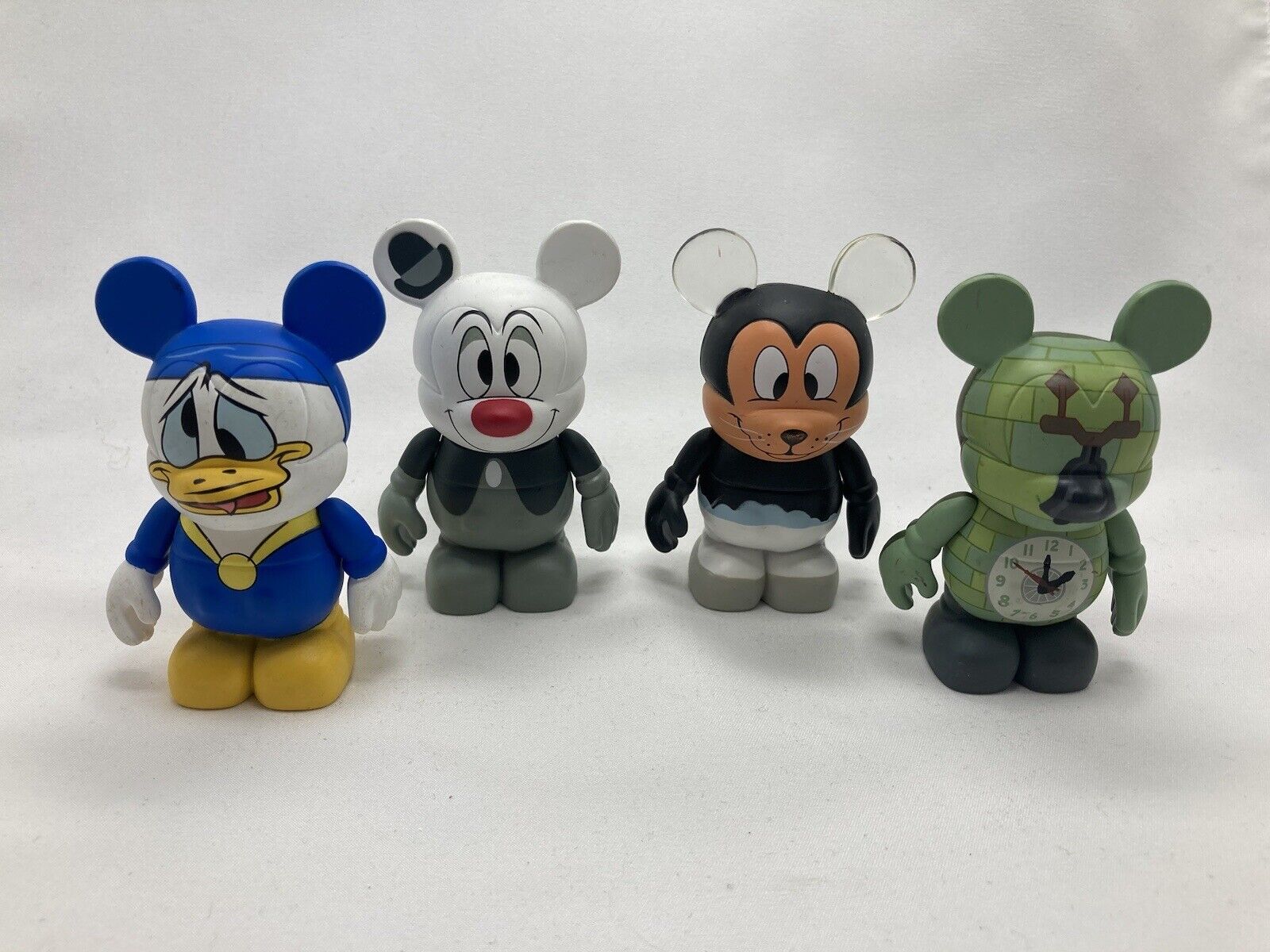 Disney Vinylmation HAVE A LAUGH Series Set of 4 Mickey Seal Clock Cleaners Etc..